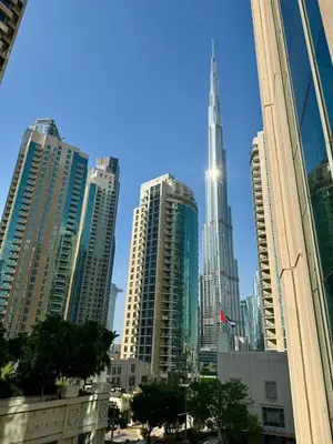 a view of a city with skyscrapers at Burj KhalifaView Luxury 1-Bedroom Apartment in Dubai
