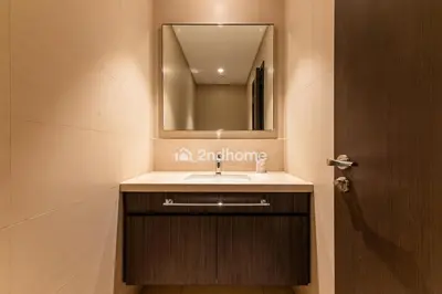 a bathroom with a sink and a mirror at Downtown Views 1 A Direct Access to Dubai Mall in Dubai