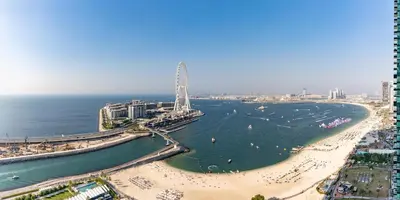 an aerial view of a beach and the ocean at 2BR Jumeirah Gate 1, Marina Skyline View in Dubai