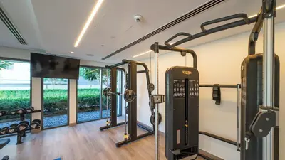 a fitness room with treadmills and a gym at Prime Downtown Location 2BR Apt Burj Royale in Dubai