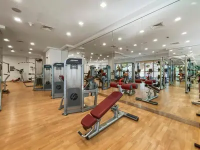 a gym with treadmills and machines in a room at BLVD Central 2 - Studio Apartment in Downtown in Dubai