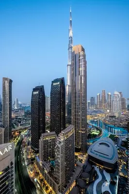 a view of a city with tall buildings and traffic at Luxurious 4BR, Burj Khalifa & full fountain view, Downtown Dubai in Dubai