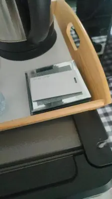 a laptop computer sitting on a wooden shelf at AHLAN Dubai Marina JBR in Dubai