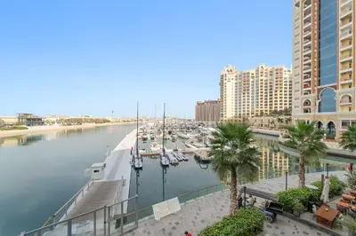 a marina with a bunch of boats in the water at Silkhaus Beach Access Studio in Palm Views East in Dubai