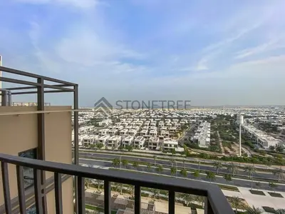 a view of a city from the balcony of a building at Modern 1BR at Collective Tower 1 Near Hills Mall in Dubai
