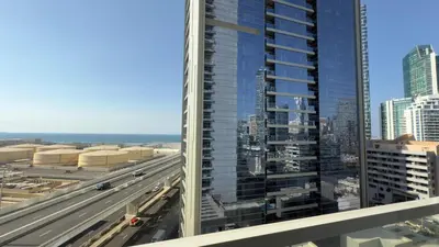 a view of a city from a building at Chic Marina Vibes 1BR Pad with Epic Views in Dubai