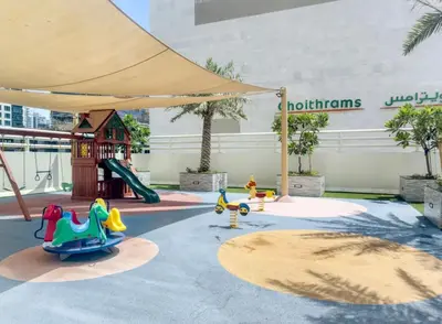 a playground with a slide and a play structure at Dubai Marina, 2 Bedrooms, apartment, sea view, JBR in Dubai