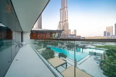 a view of a building with a swimming pool at Cozy 2-Bed Home with Burj Khalifa Views 204GR-2 in Dubai