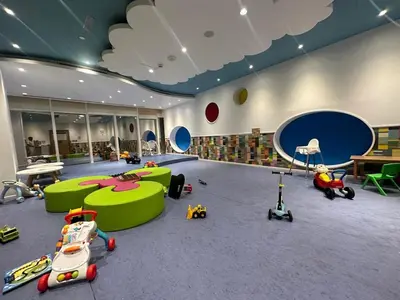a childrens room with toys on the floor at Sea View, Easy Access, Close to All Amenities in Dubai