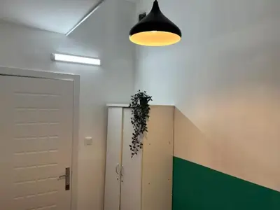 a room with a hallway with a door and a light at Bagpack Double Partition Room in Tecom Near Metro in Dubai