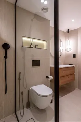 a bathroom with a toilet and a sink at 85m2 En Suite, DIFC in Dubai