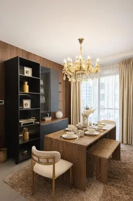 a dining room with a table and a chandelier at Modern Marina Escape 4BR Family Retreat at JBR in Dubai