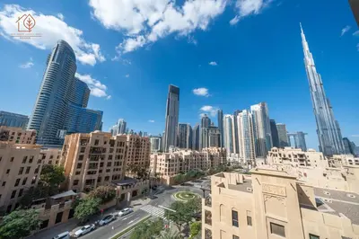 a view of a city skyline with tall buildings at Cozy Old Town 2-Bed Apartment with Burj Khalifa Views 202RH-2 in Dubai