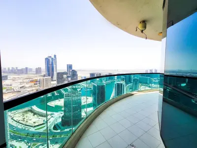 a view of the city from the top of a building at Damac Upper Crest - Blue Ocean Holiday Homes in Dubai