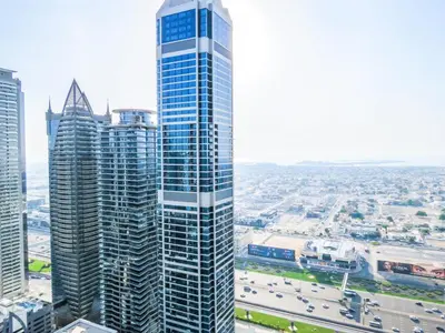 a view of a tall building in a city at High Floor , Premium 1 Bedroom , Stunning Views in Dubai