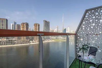 a balcony with a view of a body of water at Frank Porter - Millennium Binghatti Residences in Dubai