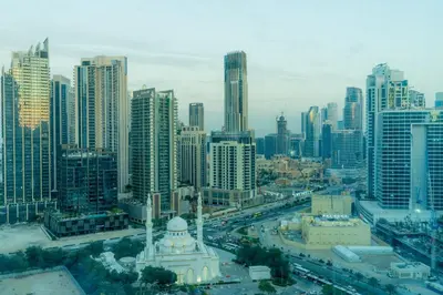 an aerial view of a city with tall buildings at Luxury 3BR Stunning Burj Khalifa View in Dubai