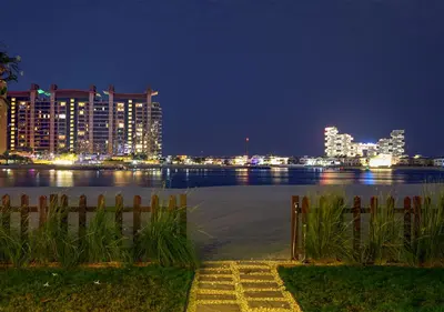 a view of a city skyline at night at Luxury Villa With breathtaking View And Beach Access in Dubai