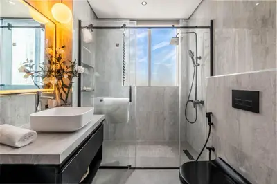 a bathroom with a sink and a shower at GuestReady - Mesmerizing Marina views at Iris Blue in Dubai