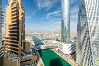 a view of a city with tall buildings and a bridge at GuestReady - Mesmerizing Marina views at Iris Blue in Dubai