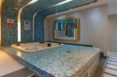 a bathroom with a tub on top of a counter at April OFFER Huge 1BKH 4people & high floor in Dubai