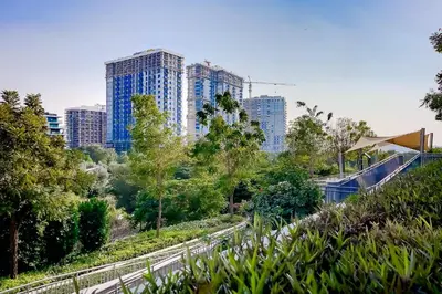 a view of a city skyline with tall buildings at Apartment in Dubai Hills Park Acacia A in Dubai
