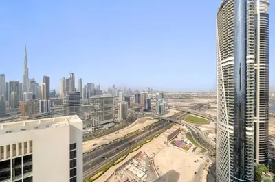 a view of a city from a skyscraper at Elegant 1BR with Panoramic Views on Burj Khalifa in Dubai