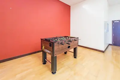an empty room with a table in the middle of it at Remodeled 1BR with Sky-High Picturesque Marina Views, Elite Residence, Dubai Marina by Deluxe Holiday Homes in Dubai