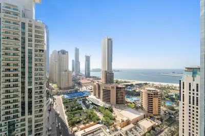 an aerial view of a city with tall buildings at Silkhaus Comfy 1BR in Botanica Tower near Dubai Marina in Dubai