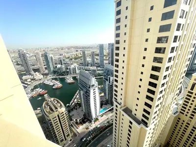 an aerial view of a city with tall buildings at ROYAL BEACH RESiDENCES 1 in Dubai