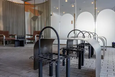 a group of chairs and a table in a room at Mood Living 22 in Dubai