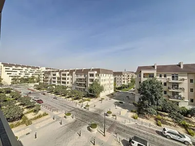 an aerial view of a parking lot with buildings at Widcombe House - Tranquil One Bed in Motor City in Dubai