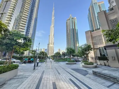 a street in a city with tall buildings at Vacationer l Marvel Super Hero Themed 3 Bedroom l Dubai Fountain Views in Downtown in Dubai