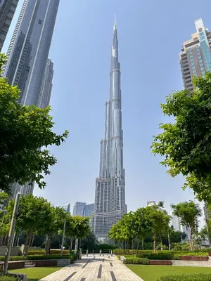 a view of the burj khalifa from a park in the city at Stylish 1BR in Act One, Downtown Near Burj Khalifa in Dubai