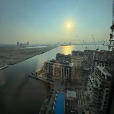 a view of a river with buildings and a city at THE COVE Creek Harbour in Dubai
