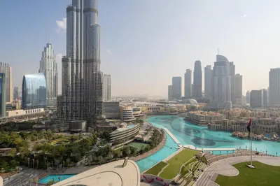 a view of a city with a river and buildings at Frank Porter - Grande Signature Residences in Dubai