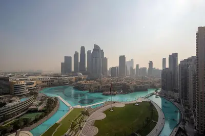 a view of a city with a river and buildings at Frank Porter - Grande Signature Residences in Dubai