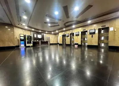 a large empty room with ailed floor in a building at Elegance Partition Room in Tecom Near ICM Metro in Dubai