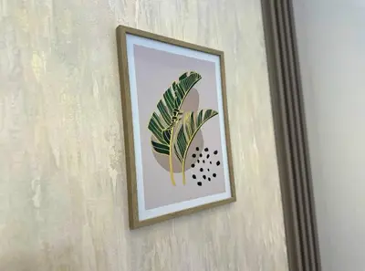 a framed picture of a plant on a wall at Elegance Partition Room in Tecom Near ICM Metro in Dubai