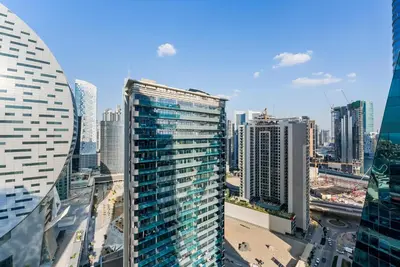 a view of a city skyline with tall buildings at LUX 2BR in Missoni Tower - 5 mins to Burj Khalifa in Dubai