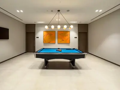 a billiard room with a pool table in it at 1 Bedroom apt High end luxurios building Next to Dubai mall in Dubai