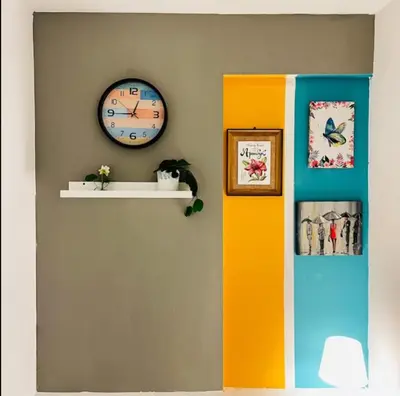 a room with a clock on the wall and a shelf at Creative Partition Room in Barsha 1 Near Metro in Dubai
