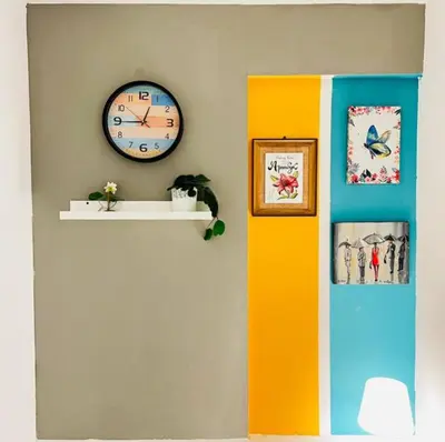 a room with a clock on the wall and a shelf at Creative Partition Room in Barsha 1 Near Metro in Dubai