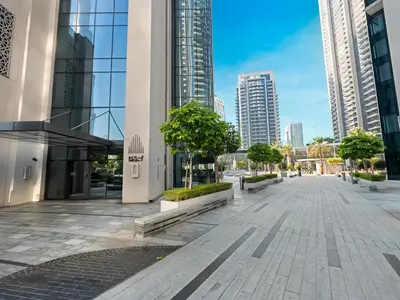 a street in a city with tall buildings at The Chic Downtown Suite Luxury near Burj Khalifa in Dubai