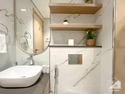a bathroom with a sink and a mirror at Rokane G25 Studio Modern Comfort with City Views in Dubai