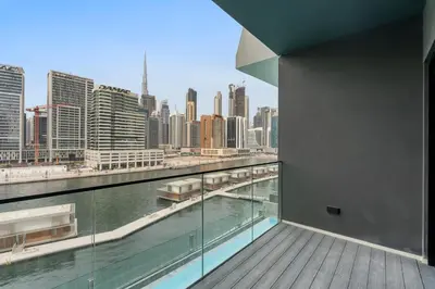 a balcony with a view of a city skyline at Exclusive Apt 4 Pex with Burj Khalifa View in Dubai