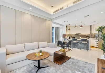 a living room with a couch and a table at 2BR Central Apt in Business Bay Noble Tower in Dubai