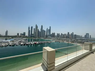 a view of a marina with boats in the water at Gorgeous Beachfront 2 Bed Retreat in Marina Vista in Dubai