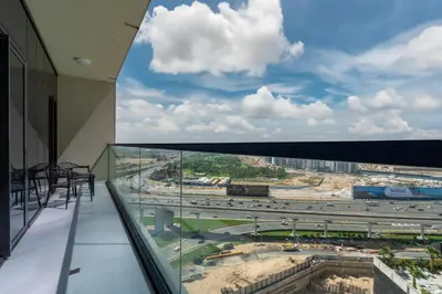an office building with a view of a highway at Keyrock Living - Elevated Luxury in Business Bay in Dubai
