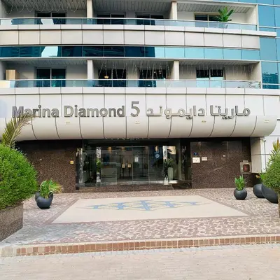 a building with a sign that reads marina diamond global hotel at Panoramic Marina View in Dubai